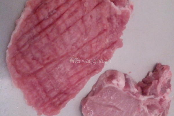 煎蒜香猪排的做法图解2