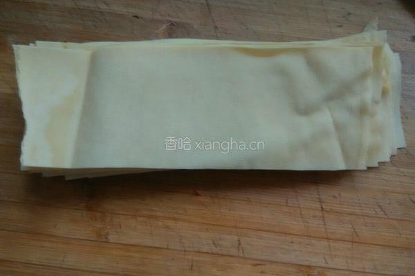 蒜苗炒千张的做法图解1