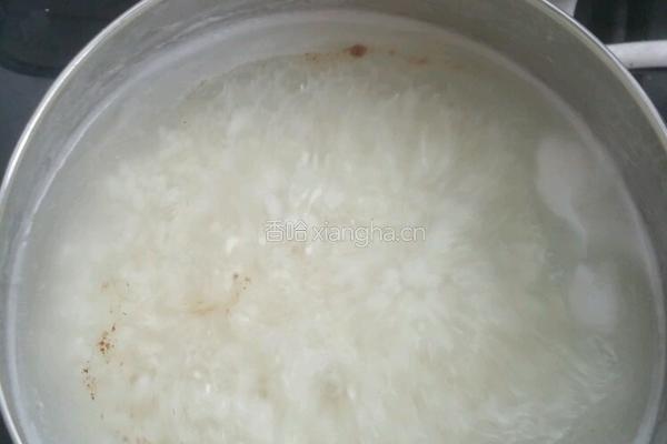 皮蛋火腿粥的做法图解4