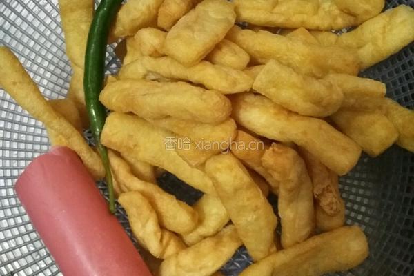 油豆腐炒火腿的做法图解1