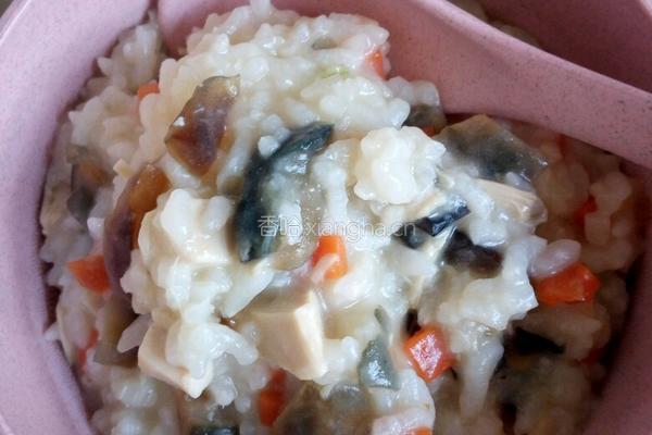皮蛋鸡肉粥的做法图解3