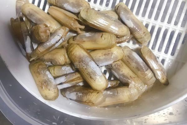 葱姜爆圣子的做法图解1