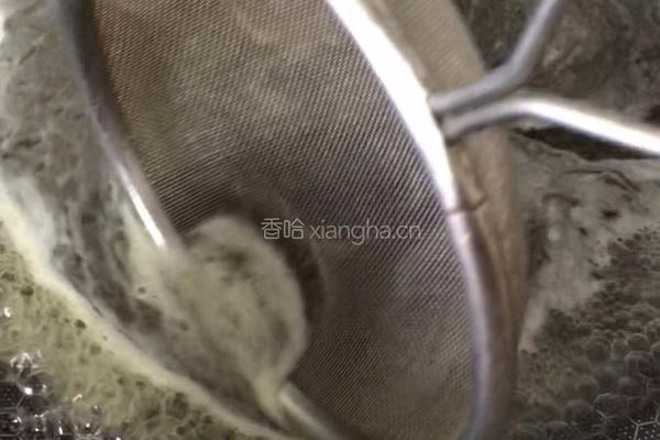 雪菜汁煮玉螺的做法图解5