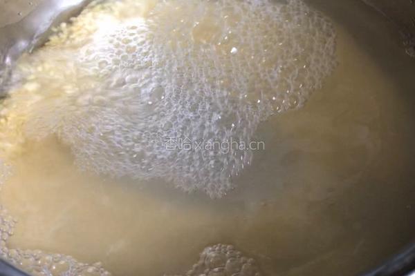 皮蛋鸡肉小米粥的做法图解3