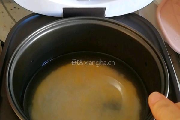 牛肉窝蛋二米粥的做法图解2